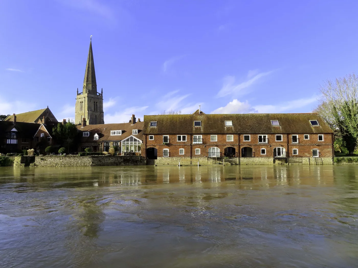 Houses on the Thames at Abingdon, below St Helen's spire